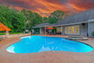 Relax under the evening sky by the pool
