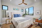Secondary bedroom with desk work area