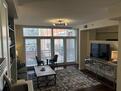 Brightly lit Living room with large balcony