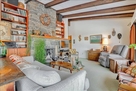 A fossil rock fire place with library
