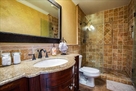 Large bathroom with a standup shower