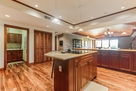 View of laundry room and family room from kit