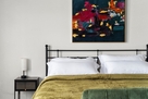 Cozy yet modern master with plush bedding and