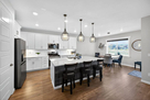 Modern kitchen with countertop seating for 3
