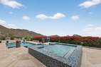 Cold plunge pool with waterfall & mountain vi