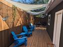 Outdoor living space with grill and dining ar