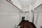 Walk-in closet in primary bedroom