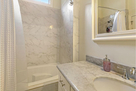 Master bath room with large tub and shower wi