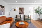 Strategically placed floor lamp creating a wa