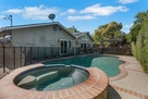 Swimming pool & hot tub with safety pool fenc