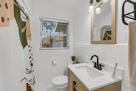 bathroom with shower and bathtub