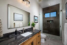 Primary en-suite bathroom, beautiful stone