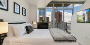 25th Floor Spire Condo Plus Den