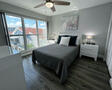 Second bedroom upstairs with queen bed