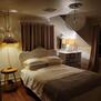 Queen bed, blackout curtains, tv.