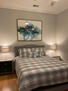 Master bedroom with queen bed