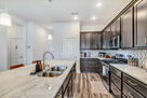 Kitchen with all major appliances.