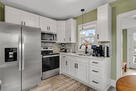Beautiful Farmhouse on Pond and 40 Acres
