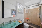 Updated 3 piece bath adjacent to media room/ 