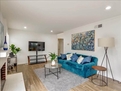 Family room with fireplace and TV
