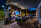 Outdoor covered kitchen and bar