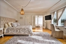 view of sun room in king bedroom