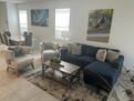 Open concept living and dining room with pict