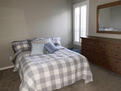 Small bedroom #2 overlooks the backyard and p