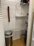 Laundry/Pantry with plenty of shelving.