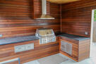 Premium enclosed grill with prep space