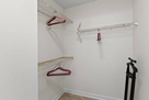 Walk-in master bedroom closet.