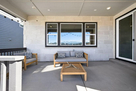 Lighted, furnished, and decorated back porch