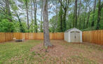 Backyard fire pit and shed