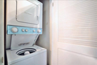 Laundry in hallway of home