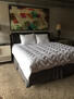 King size bed with leather headboard