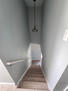 well lit hallway stairs