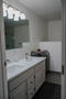 Dual-sink vanity with modern lighting