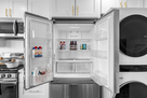 Stainless-steel fridge w/ ample space for sto
