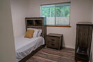 Comfortable guest bedroom with twin beds