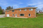 Rear Exterior with Spacious Backyard
