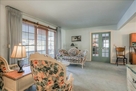 Formal living- French doors to t.v. room.