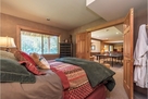 Down stair queen bedroom w view of private ba