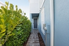 Lush Landscaped Walkway to Front Door Entranc