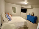 Side view of double bedroom in lower level