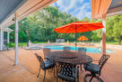 Covered patio overlooking garden views