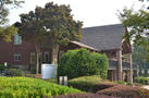 Back of clubhouse & entrance to pool & gym