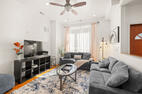 Living room with Roku smart TV and sofa bed