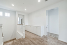 Second Floor hallway with ample Linen Storage