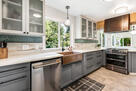 Kitchen with custom hammered copper sink.