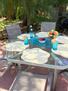 Patio table set-up with beverages.